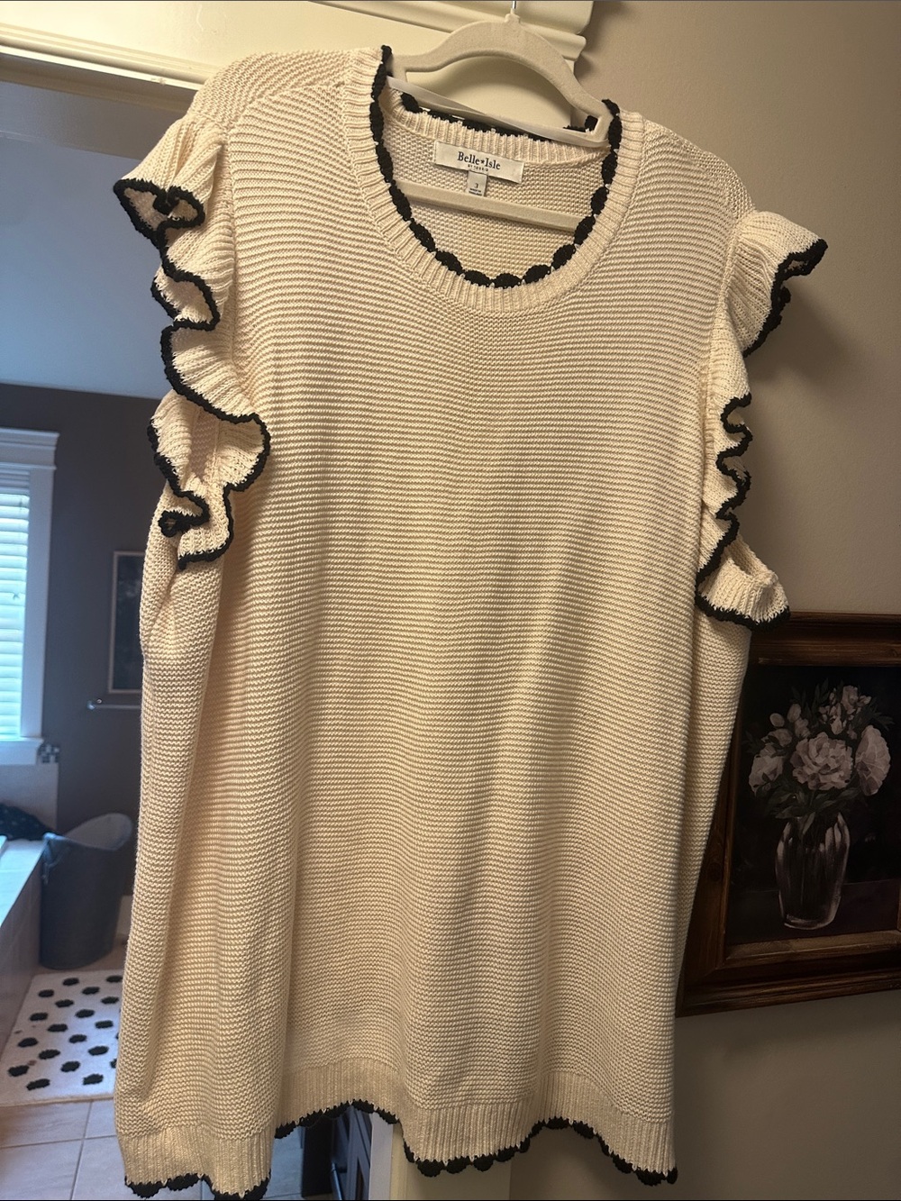 Belle+Sky Cream Ruffle Knit Top with Black Trim